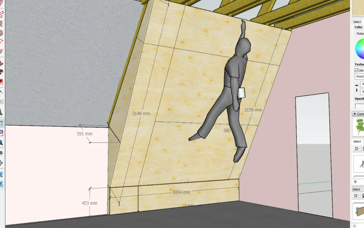 Projekt 3D pokazuje, jak zrobić ściankę wspinaczkową z wymiarami i postacią wspinacza.