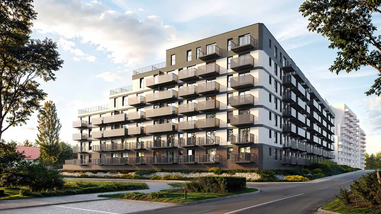 Nowoczesny budynek mieszkalny z licznymi balkonami. To doskonały przykład, co to jest lokal inwestycyjny &ndash; przyszłościowy zakup.