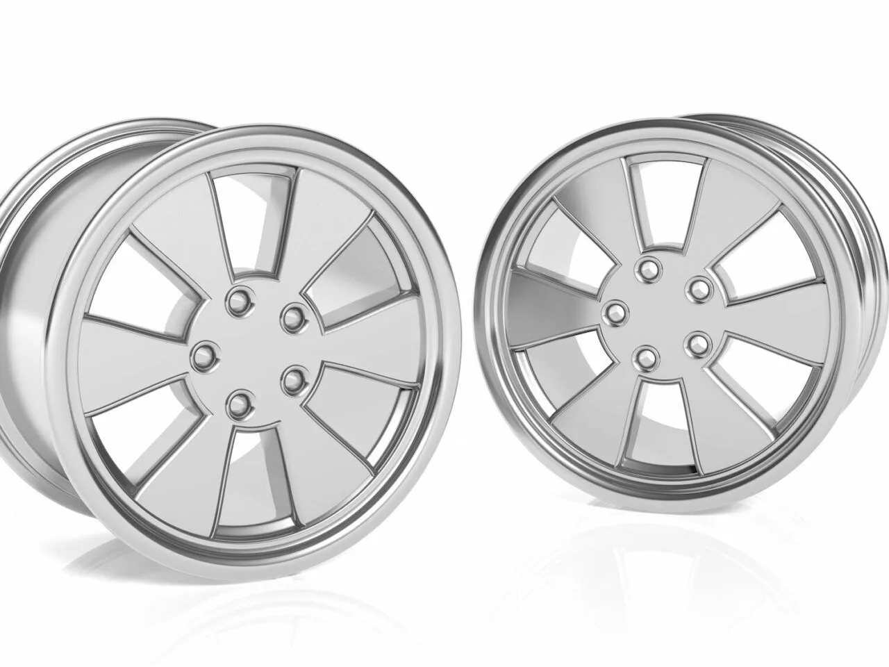 Dwie błyszczące felgi aluminiowe na białym tle. Zastanawiasz się, ile waży felga aluminiowa?