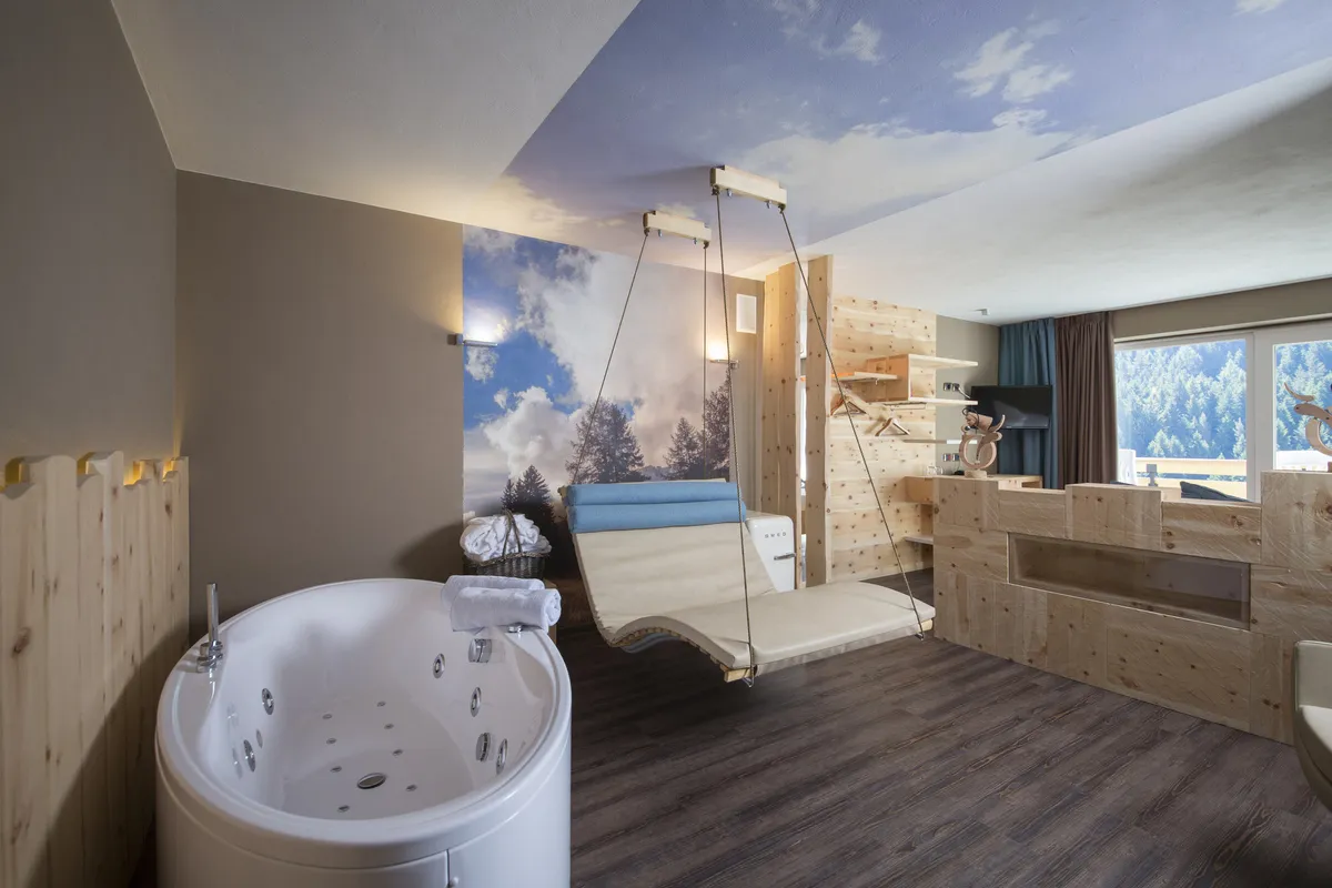 Olympic Spa Hotel camere suite legno cirmolo design