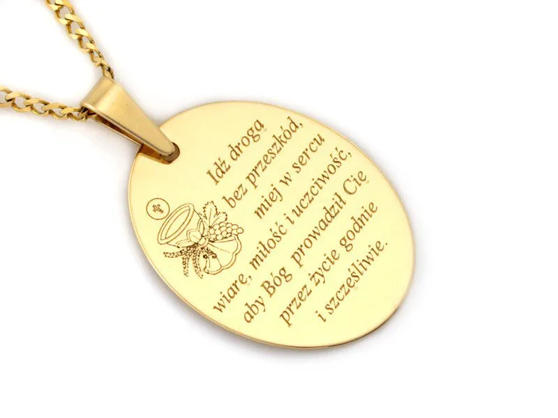 złoty medalik z grawerem na komunię