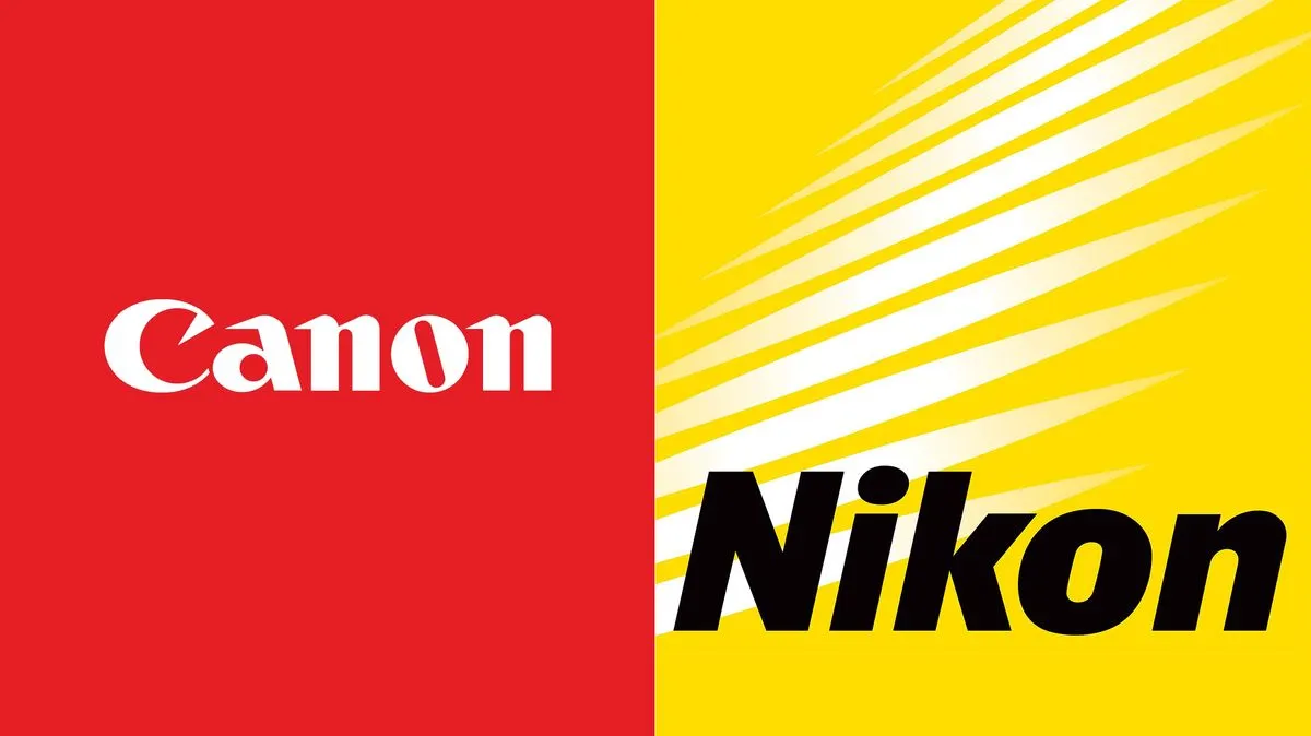 logo Canon vs Nikon