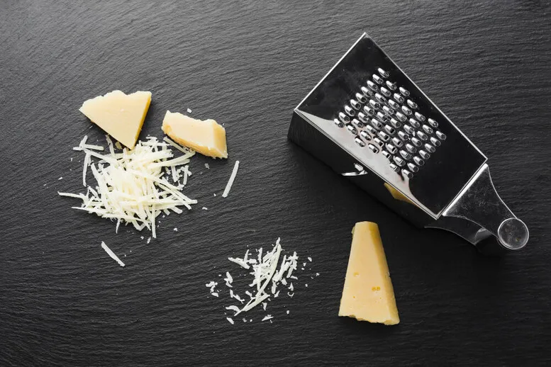 Zdjęcie Czy parmezan można zastąpić grana padano? Odkryj smaki i różnice