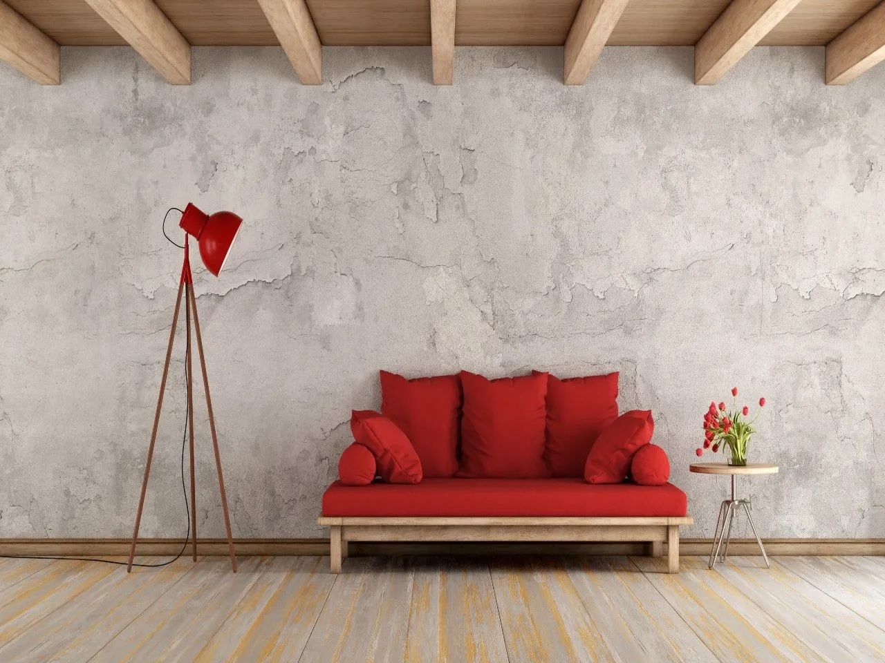 czerwona kanapa przy ścianie z cegły