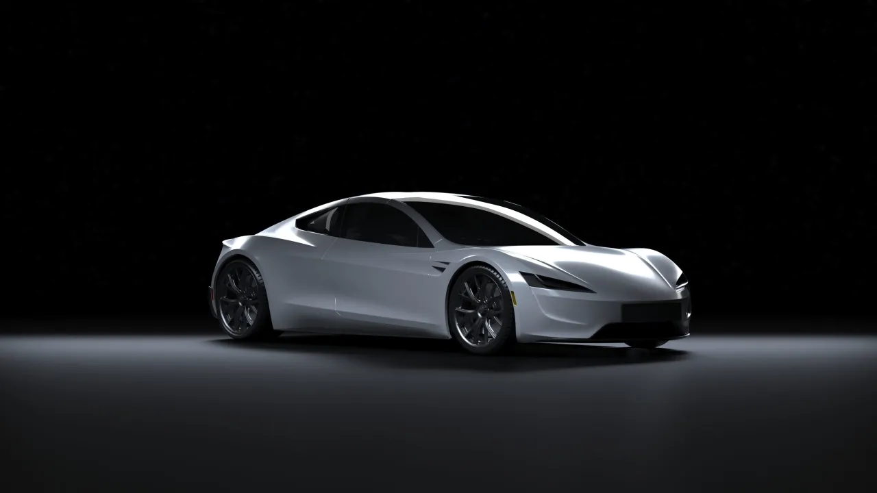 Biały, sportowy samoch&oacute;d Tesla Roadster na czarnym tle. Zastanawiasz się, ile kosztuje Tesla?