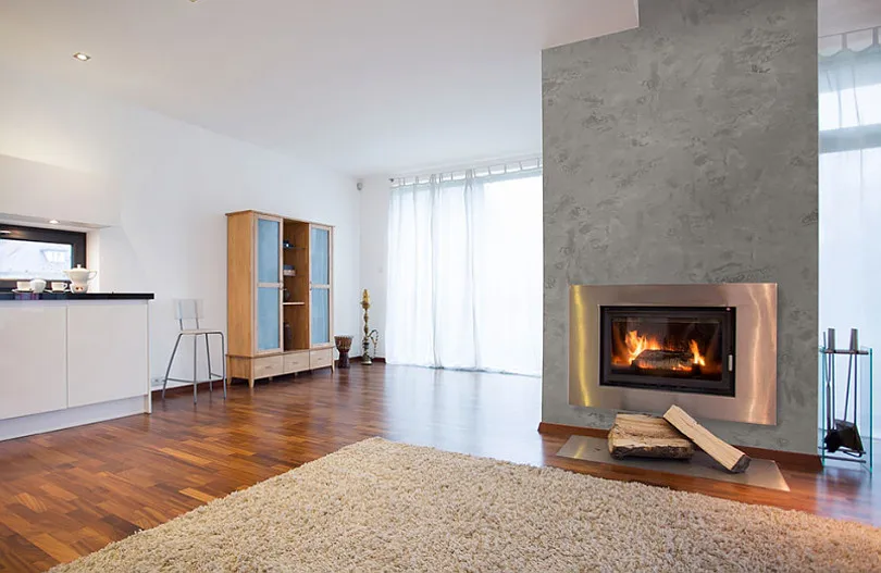 Kominek pomalowany na biało lub szaro, kominek z efektem betonu