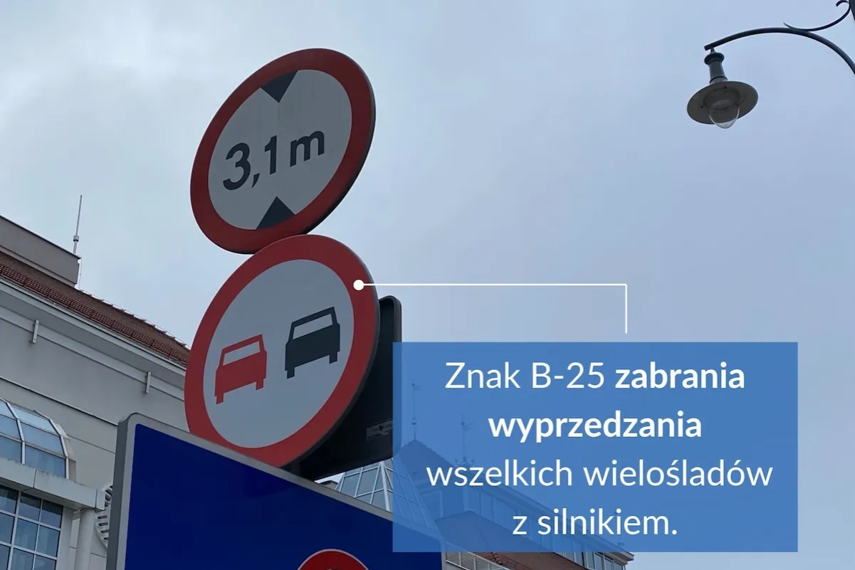Znaki drogowe: zakaz wyprzedzania dla pojazdów silnikowych i ograniczenie wysokości do 3,1m. Uważaj, by nie dostać mandatu za wyprzedzanie na zakazie.
