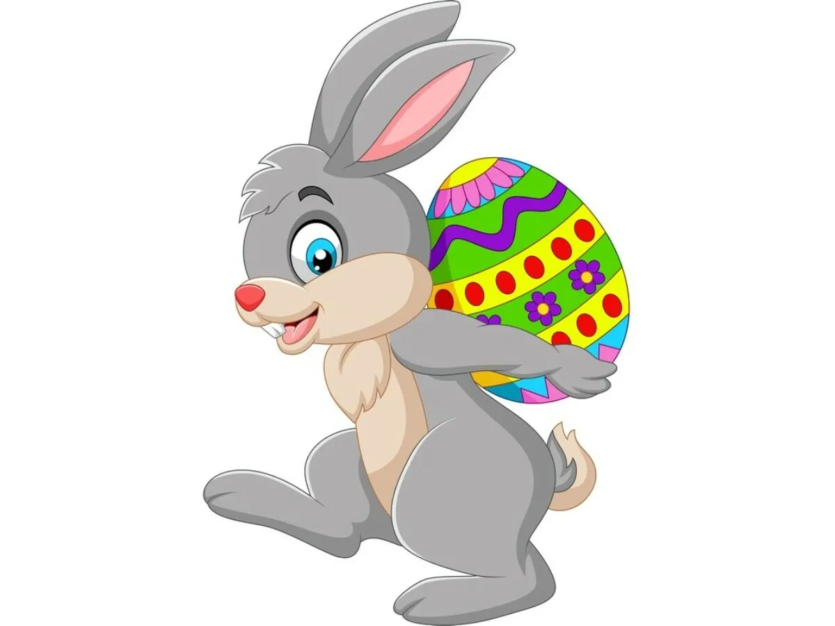 Zajączek z kolorowym jajkiem wielkanocnym. Dlaczego zajączek jest symbolem wielkanocy? Bo symbolizuje płodność i nowe życie.