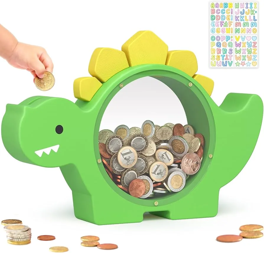 dziecięca skarbonka i rosnące monety symbol oszczędzania