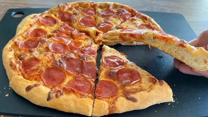 pizza casera con base blanda y aguada