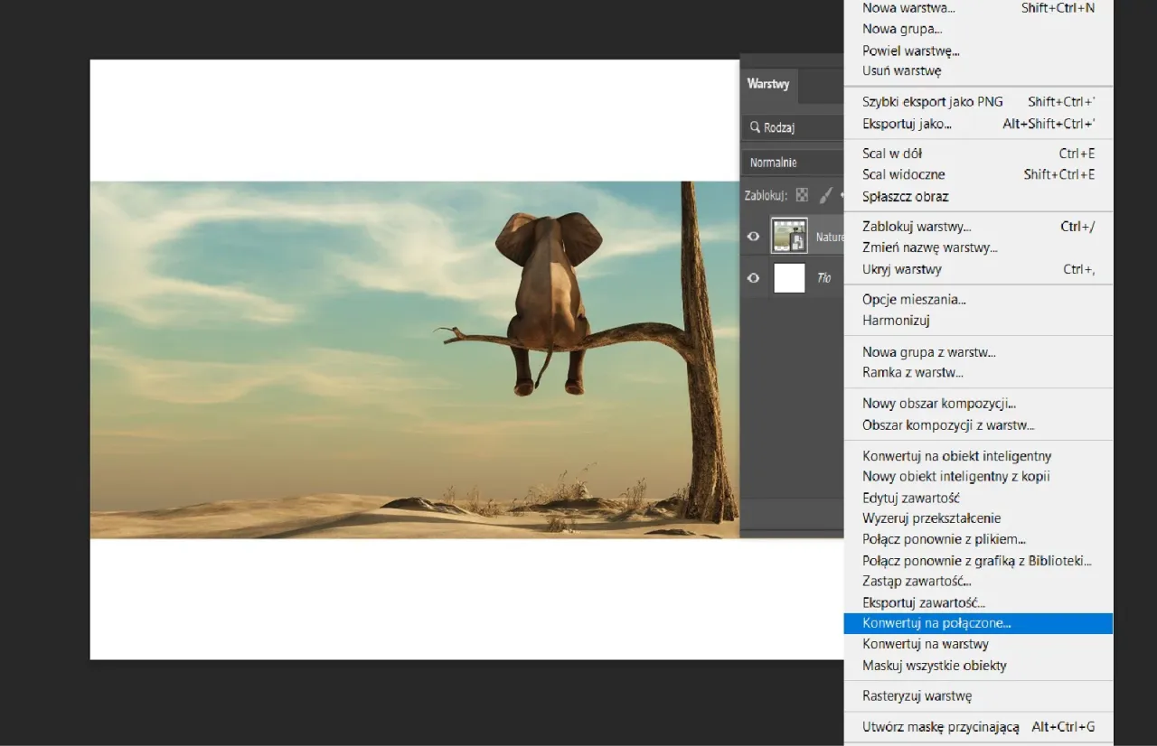 Słoń na drzewie w Photoshopie. Menu warstw pokazuje opcję 