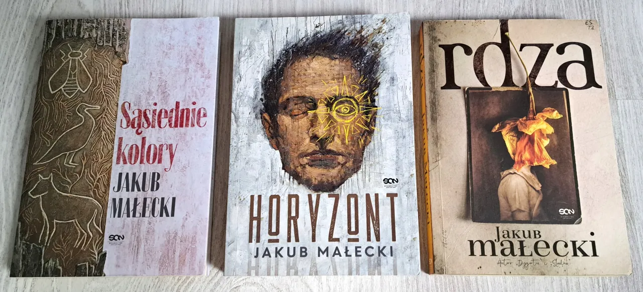 okładki książek Jakub Małecki Rdza Saturnin