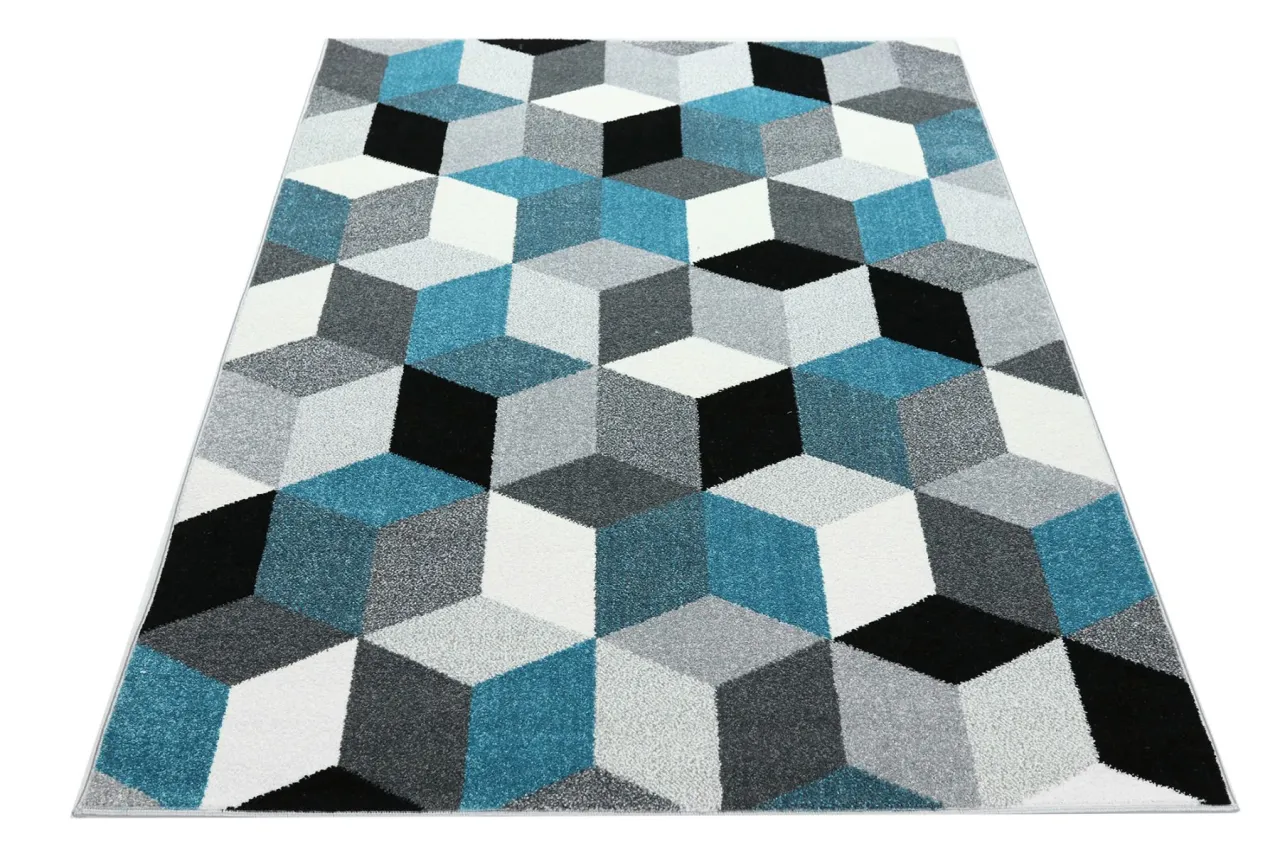 Dywan geometryczny do turkusowej kanapy