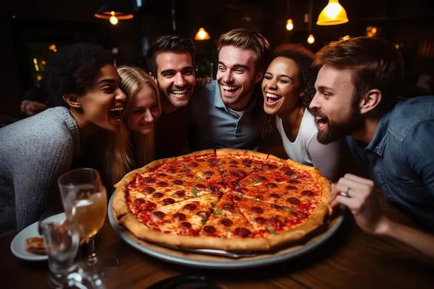 amigos compartiendo una pizza grande en un restaurante