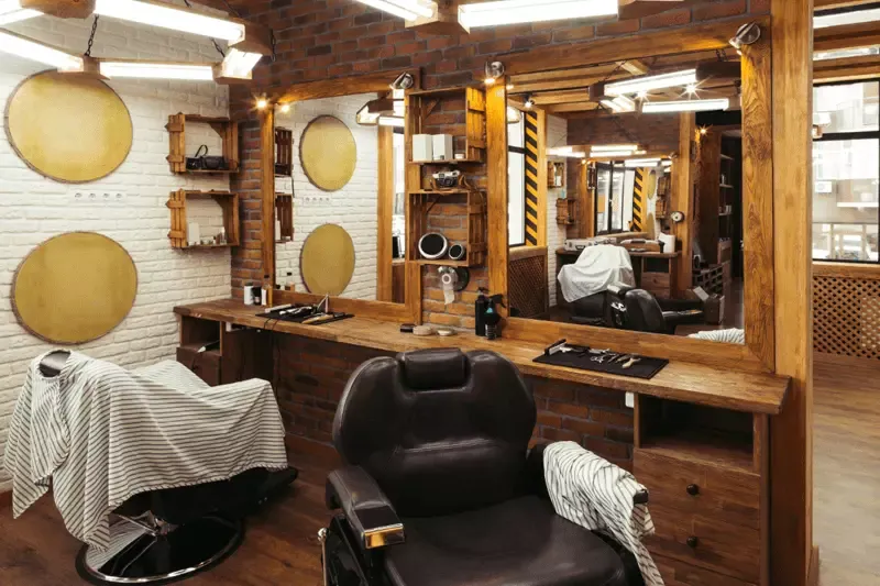 Wnętrze luksusowego barbershopu, elegancki wystrój, męski salon fryzjerski