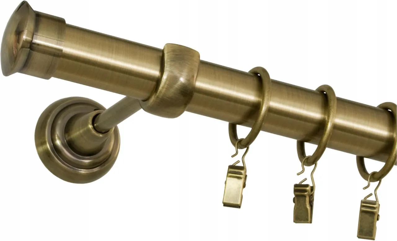 Stylowe karnisze Bojanek, gdzie kupić? Metalowy drążek z uchwytem i k&oacute;łkami do zasłon w kolorze antycznego złota.