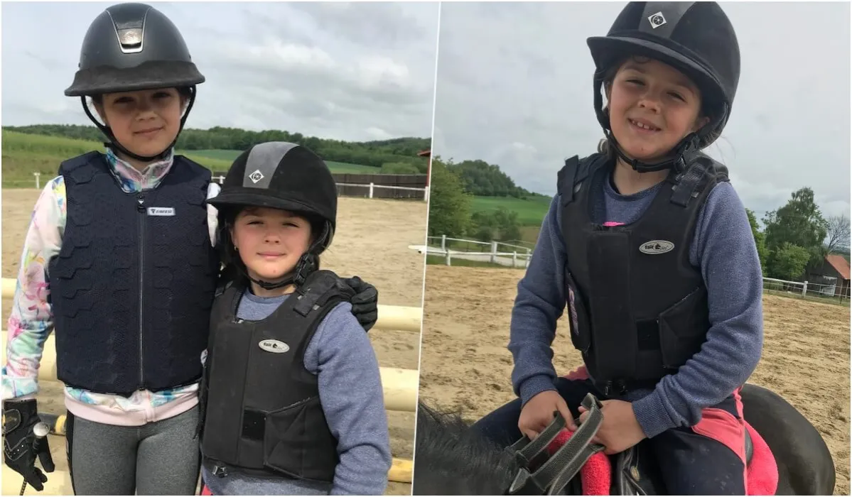 dziecko w kasku jeździeckim i kamizelce ochronnej