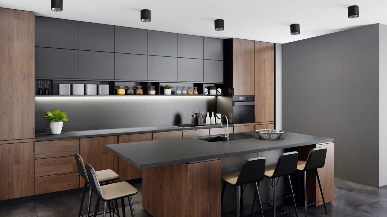 Nowoczesna kuchnia z wyspą. Dwa okrągłe reflektory sufitowe zapewniają idealne jakie oświetlenie nad wyspą kuchenną.