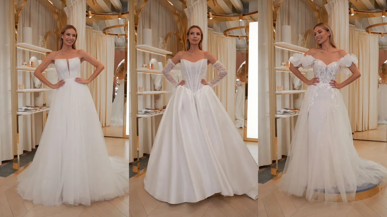 Panna młoda w salonie sukien ślubnych przymierza suknię