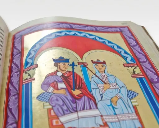 średniowieczny kronikarz piszący księgę iluminacja