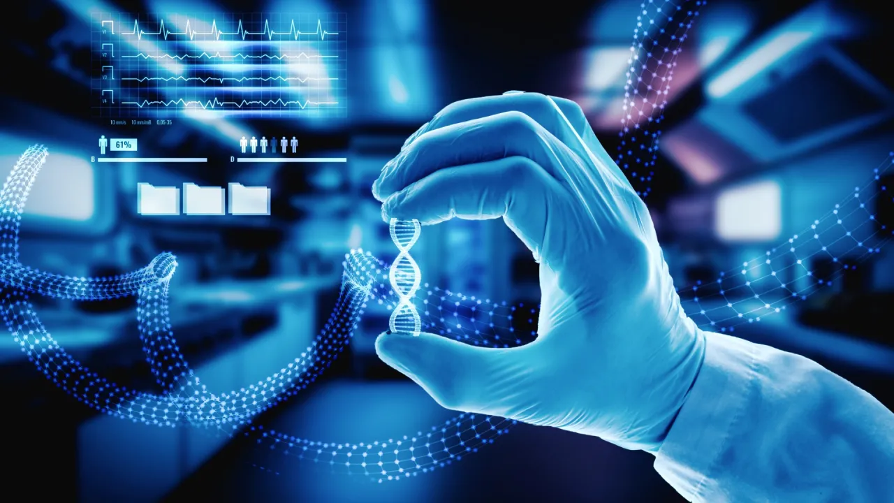 Rękawiczka trzyma hologram DNA, a na ekranie widać wykresy EKG i dane. To wizualizacja tego, jak sztuczna inteligencja zmieni nasze życie w medycynie.