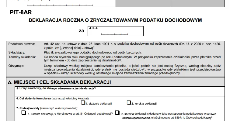 Polska deklaracja podatkowa PIT z kalkulatorem i długopisem
