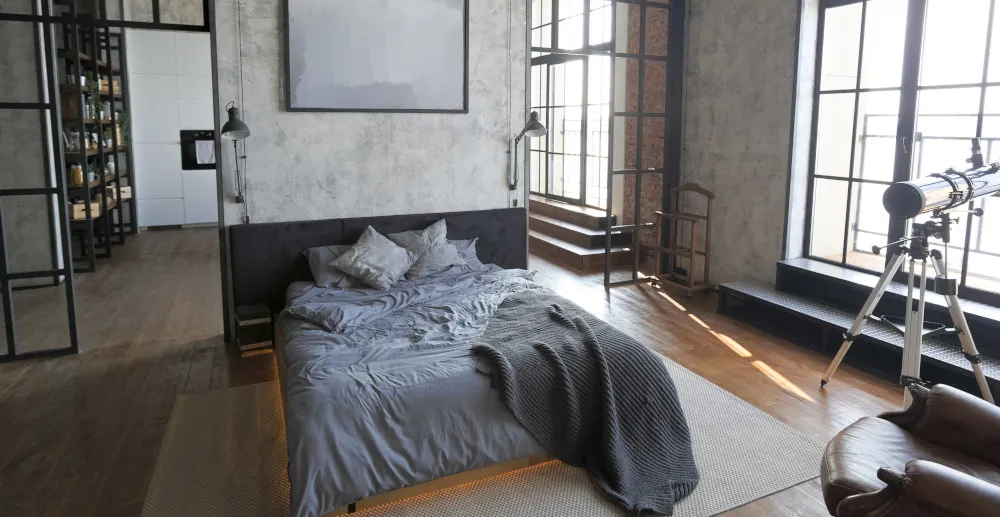 kawalerka wydzielona sypialnia zasłony parawan regał