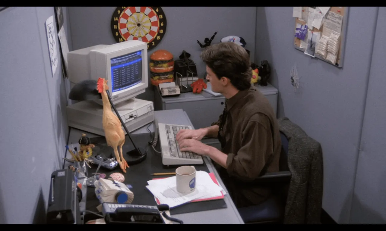 Chandler Bing at work desk