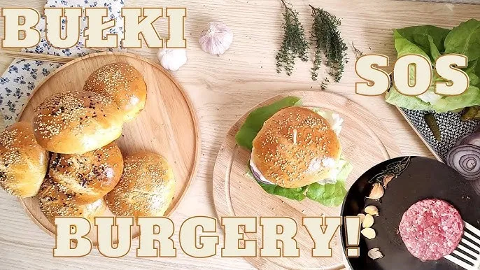 przekr&oacute;j idealnie złożonego hamburgera, warstwy składnik&oacute;w, sosy, mięso, bułka
