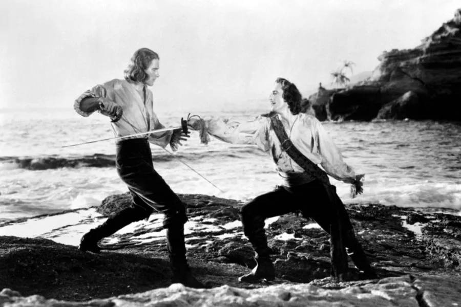 aktorzy filmy płaszcza i szpady Jean Marais Errol Flynn