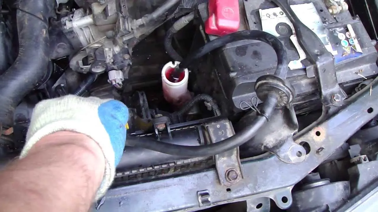 Toyota Corolla engine bay coolant reservoir location