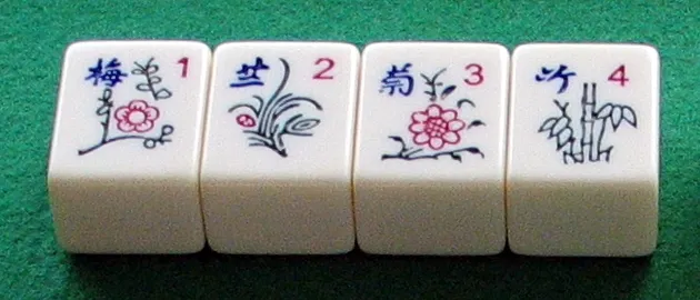 Rodzaje kamieni Mahjong: k&oacute;łka, bambusy, znaki, wiatry, smoki