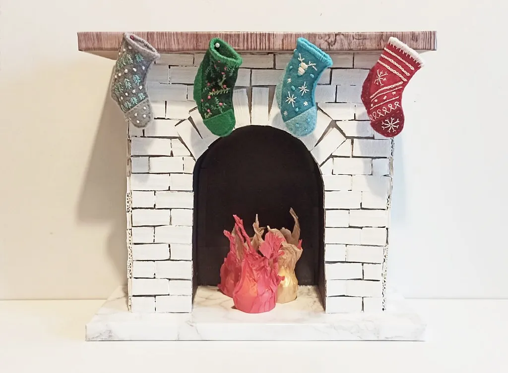 różne style kominków z kartonu inspiracje