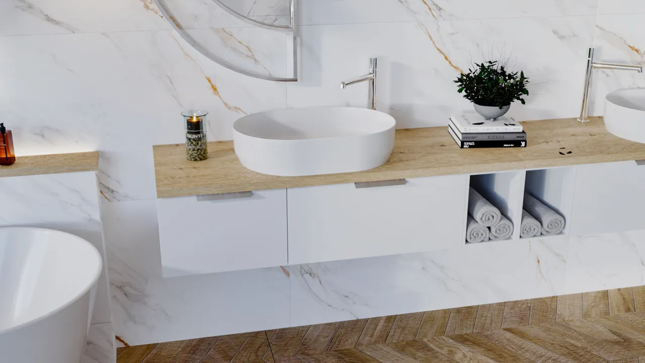 Elegancka łazienka z umywalką nablatową, baterią i ukrytym syfonem do umywalki nablatowej. Wnęki z ręcznikami i dekoracje.