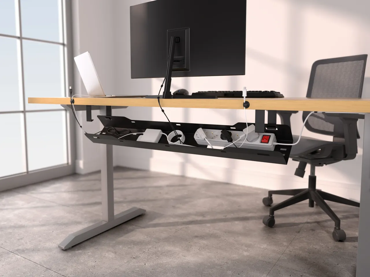 przykłady akcesori&oacute;w do zarządzania kablami na biurku