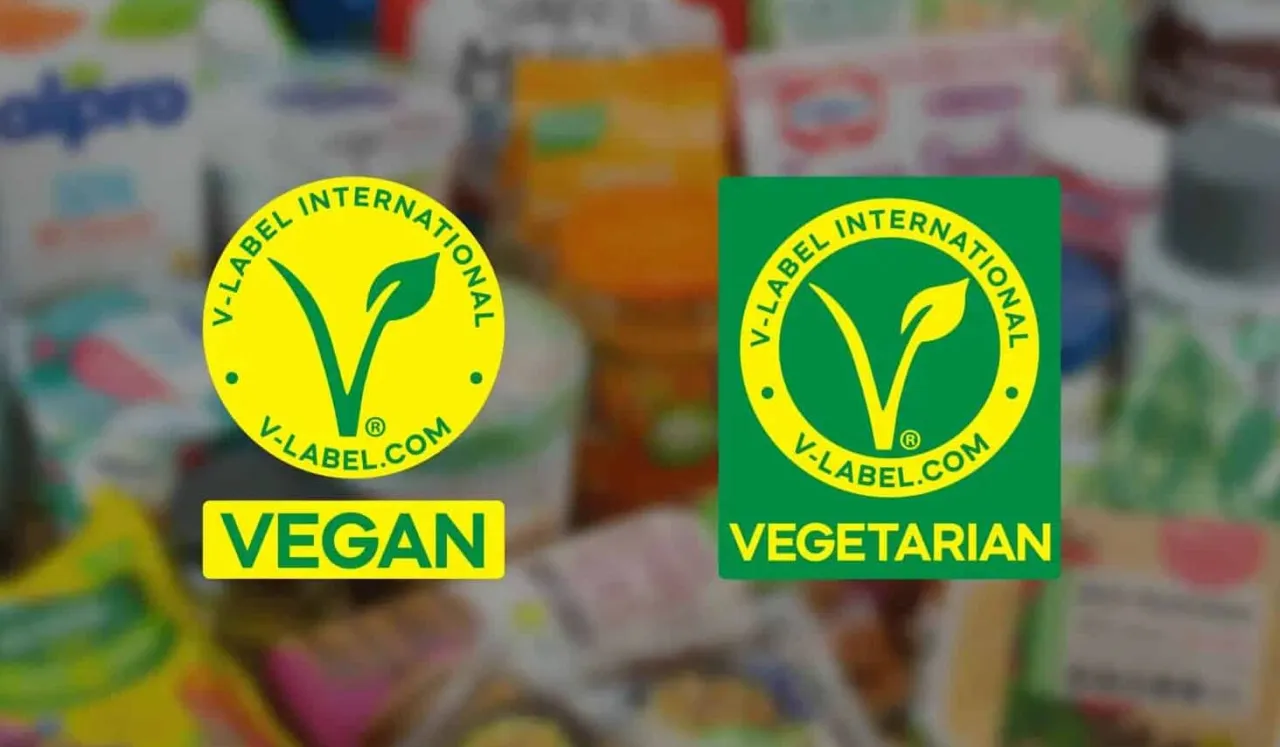 Dwa certyfikaty V-Label: ż&oacute;łty z napisem VEGAN i zielony z napisem VEGETARIAN. Czy gorzka czekolada jest wegańska? Sprawdź etykietę!