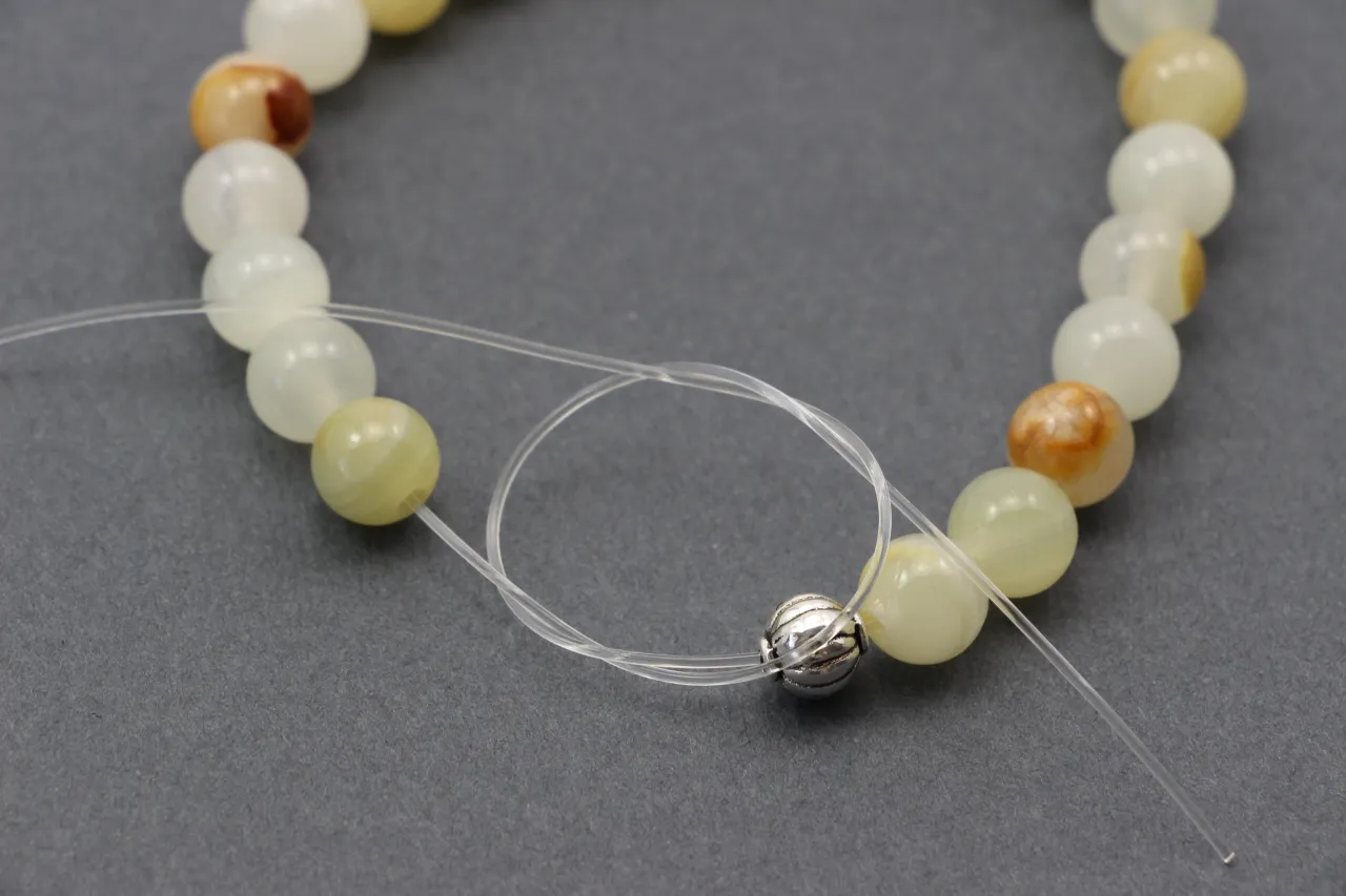 Jak zawiązać bransoletkę na gumce