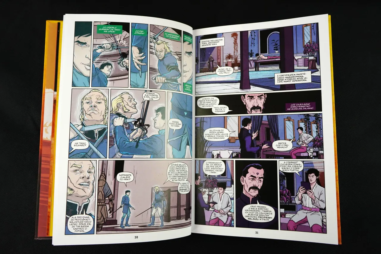 Czy komiks to książka? Na stronach 30 i 31 widać panele z ilustracjami i dialogami, przedstawiające postacie w strojach z epoki, dyskutujące o walce i przyszłości.