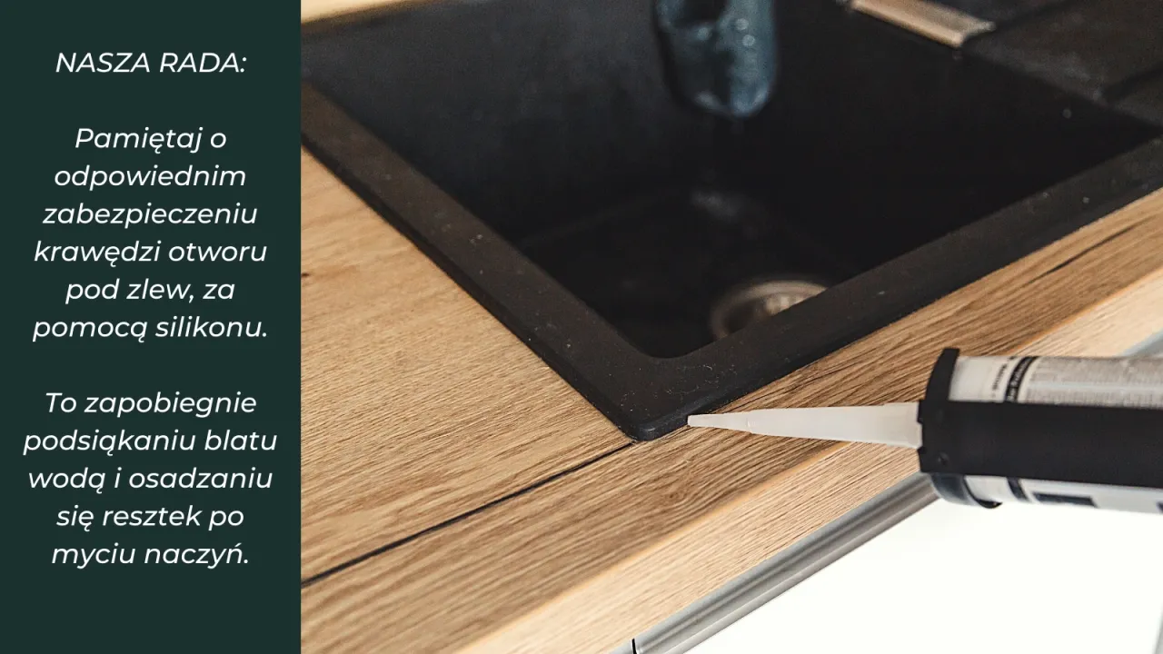 Zlew czarny z drewnianym blatem w kuchni