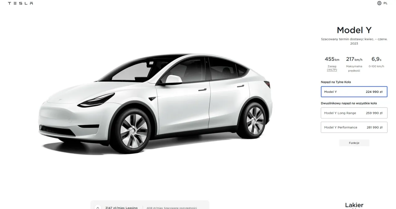 Biały Tesla Model Y. Sprawdź, ile kosztuje samoch&oacute;d Tesla w r&oacute;żnych wersjach: od 224 990 zł.