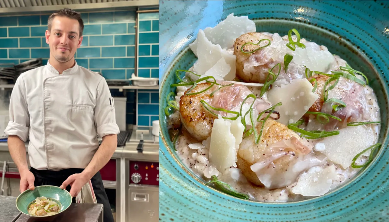 chef dressant un risotto aux Saint-Jacques dans une assiette creuse avec une pince