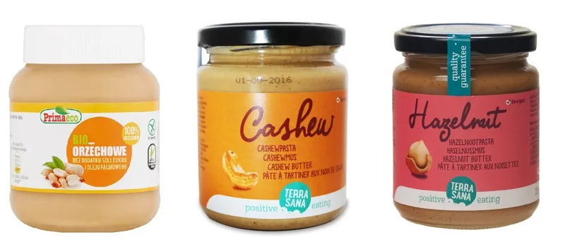 r&oacute;żne rodzaje maseł orzechowych słoiki