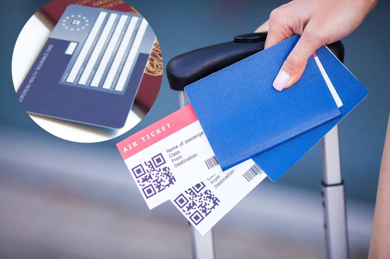 Stos dokumentów i długopis, z kartą EKUZ na wierzchu