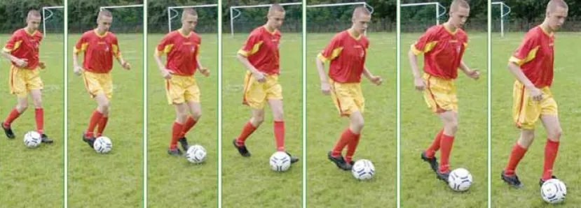 Piłkarz kontrolujący piłkę blisko stopy niska pozycja