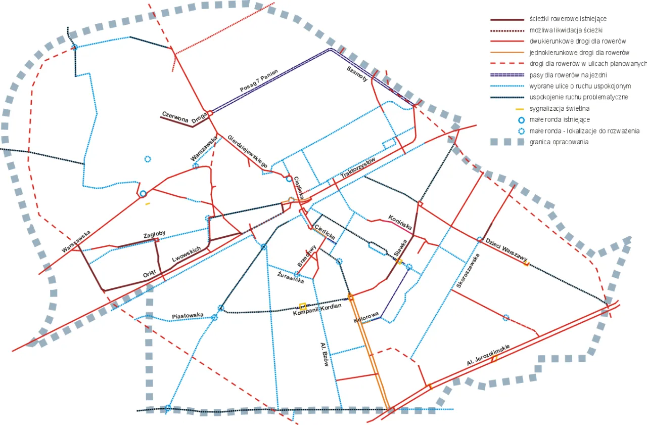 Mapa tras rowerowych w Warszawie z zaznaczonymi ścieżkami, drogami i rondami.
