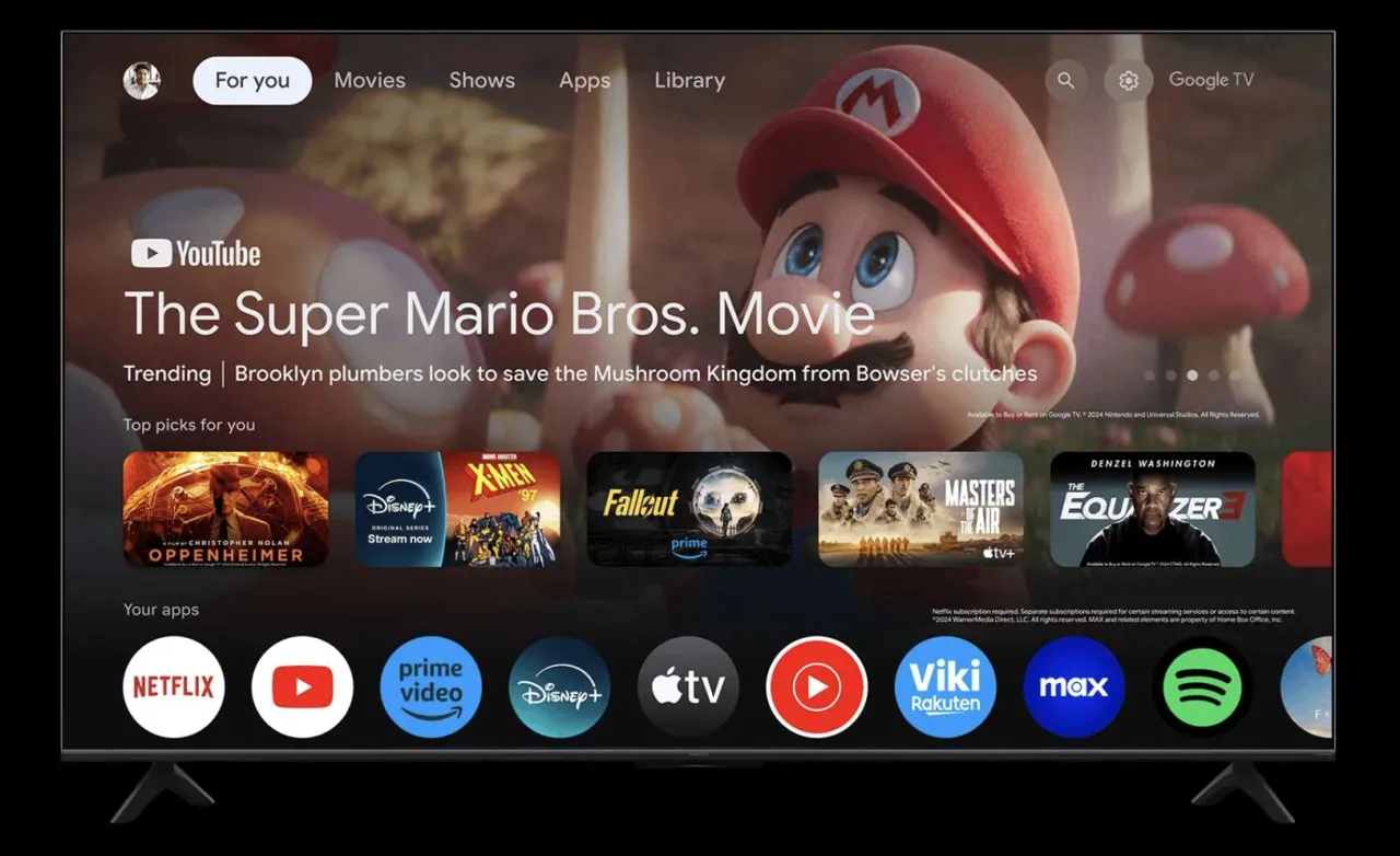 Aplikacja Google TV: ekran główny z Mario, filmami i Twoimi ulubionymi aplikacjami jak Netflix, YouTube, Disney+.