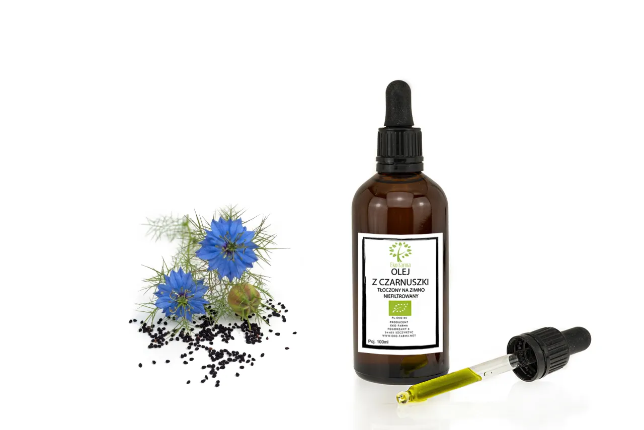 Olej z czarnuszki butelka i nasiona