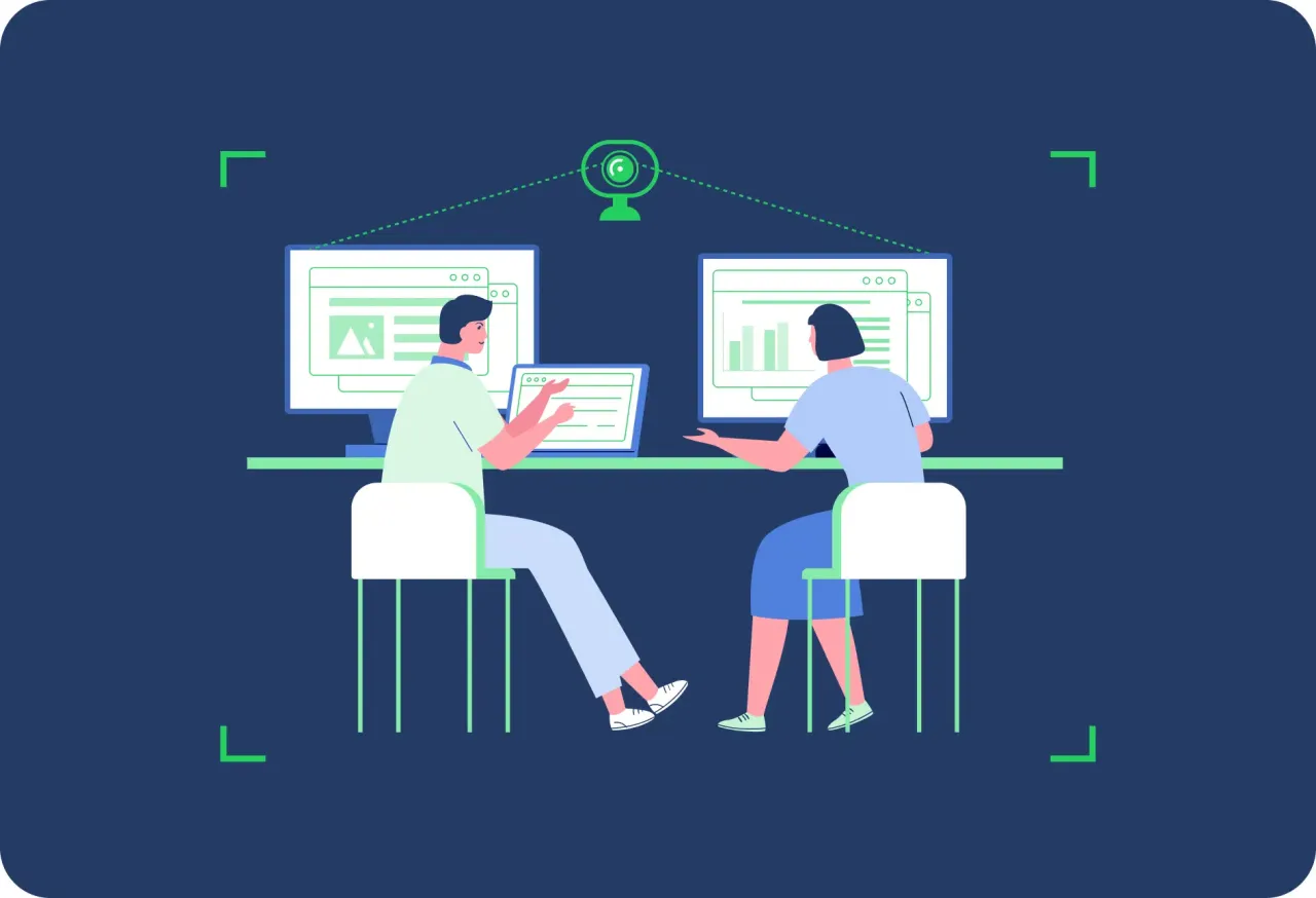 Dwie osoby pracują przy komputerach, nad nimi kamera. Ilustracja pokazuje, jak sprawdzić czy komputer jest monitorowany.