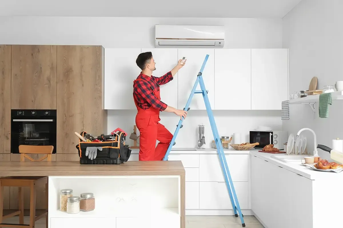 kuchnia z płytą indukcyjną i klimatyzacja w mieszkaniu