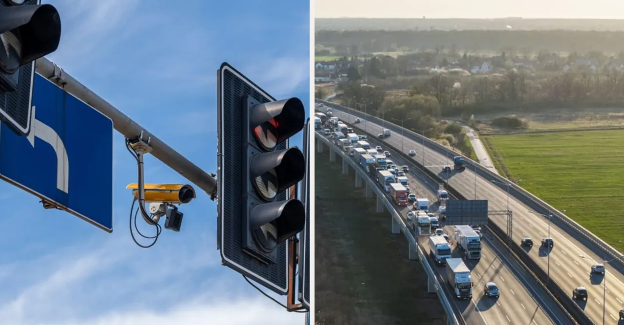 Kamery rejestrujące przejazd na czerwonym świetle są zamontowane przy sygnalizacji świetlnej. Obok widać autostradę z korkiem.